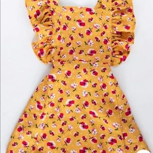 NWT toddler girl mustard dress with magenta flowers. Size 2T.